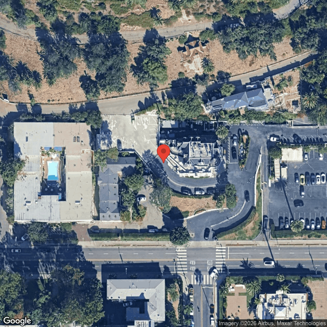 Existing-conditions aerial of HCM-406 Magic Castle (Lane Mansion) on Franklin Avenue, showing the castle building and surrounding members-club gardens.